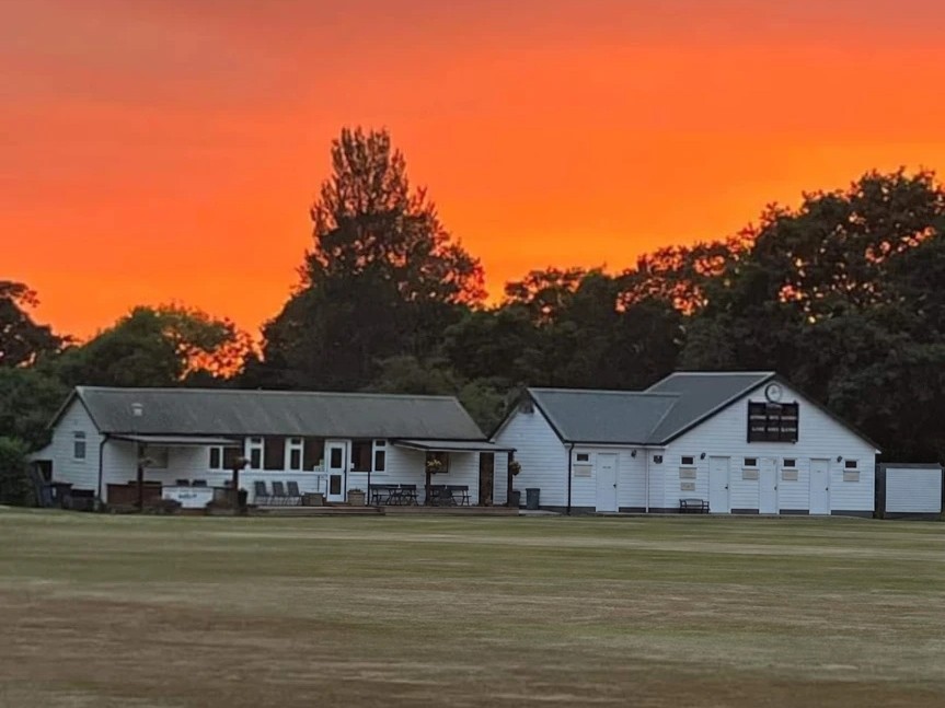 Binfield Cricket Club's pavilion at sunset